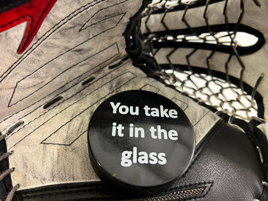 Take Glass Offensive Hockey Puck